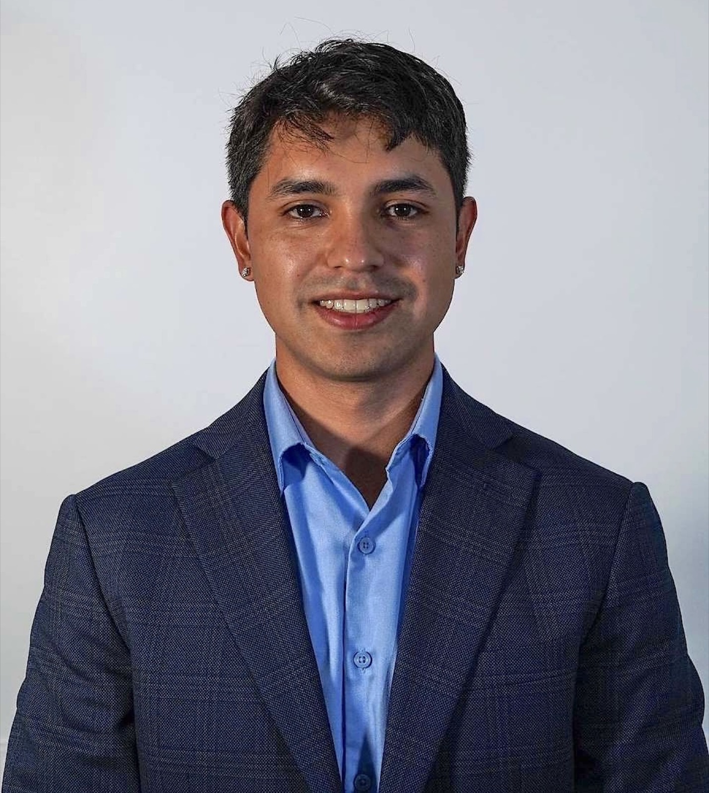 Professional headshot of Anthony Huete-Jacobs