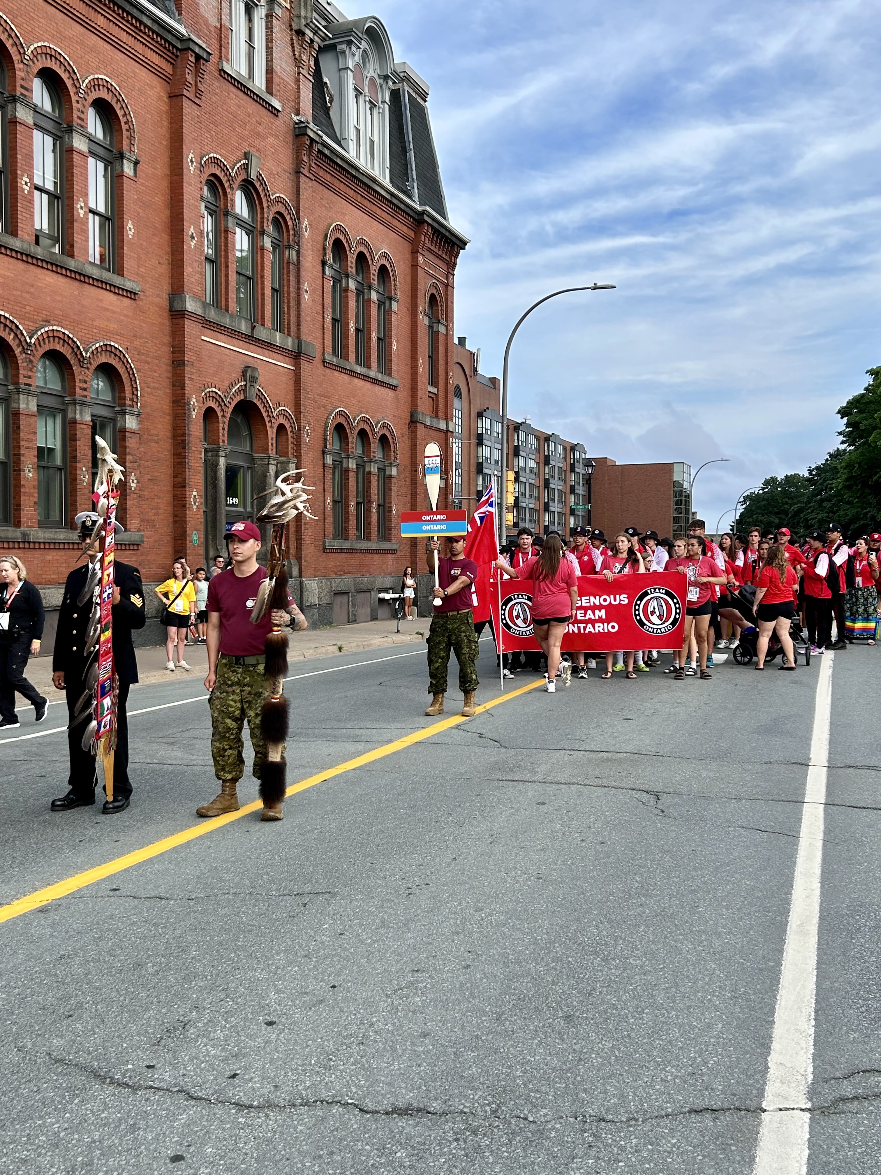 Black Bear program participants marching in the North American Indigenous Games parade in 2023